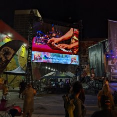 Music festival with mobile stage, LED wall, ground support structure